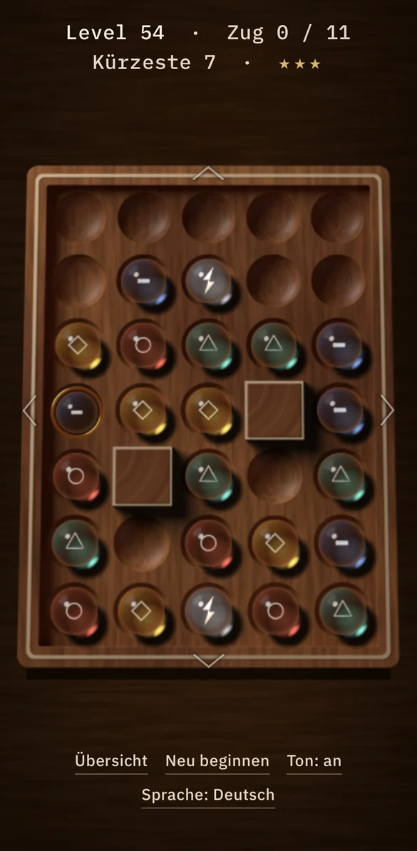 Quiet Gravity, level 54: a full board with four colours, an anchor set in brass, two blast stones and two solid walls.